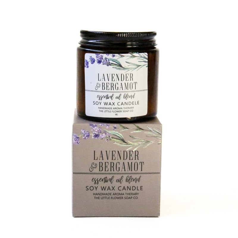 Lavender and Bergamot candle with packaging on a white background