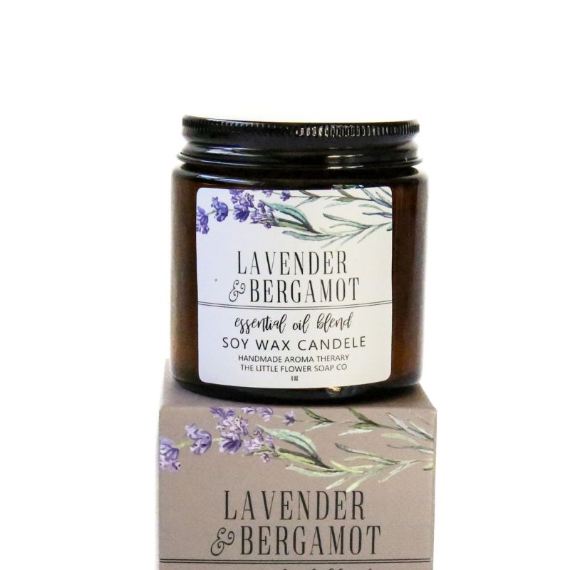 Lavender and Bergamot soy wax candle with packaging on a white background