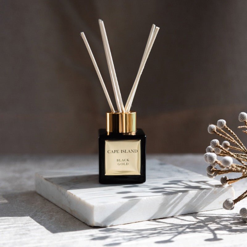 Cape Island diffuser on a marble surface with a blurred background