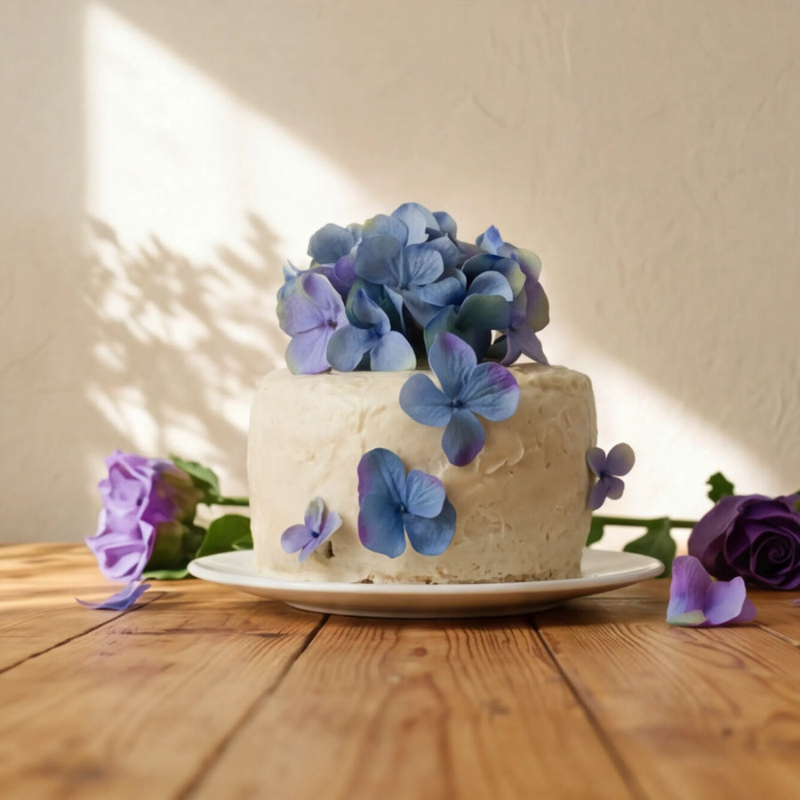 Blue Blossom Harmony Madeira Cake with hydrangea crown styled with purple roses by Fabulous Flowers Cape Town