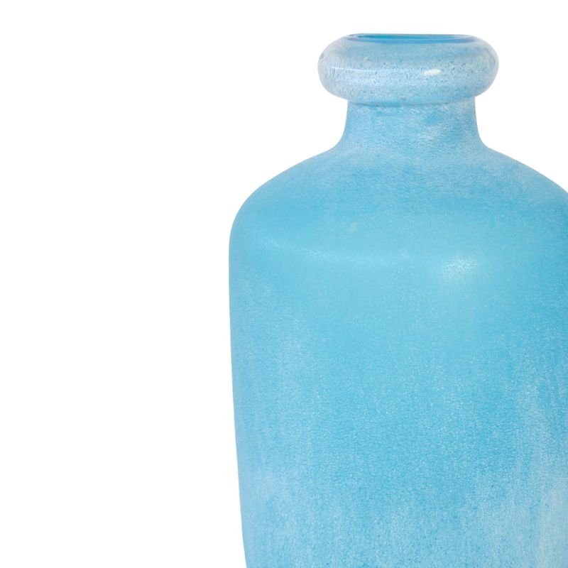 Blue textured vase on a white background