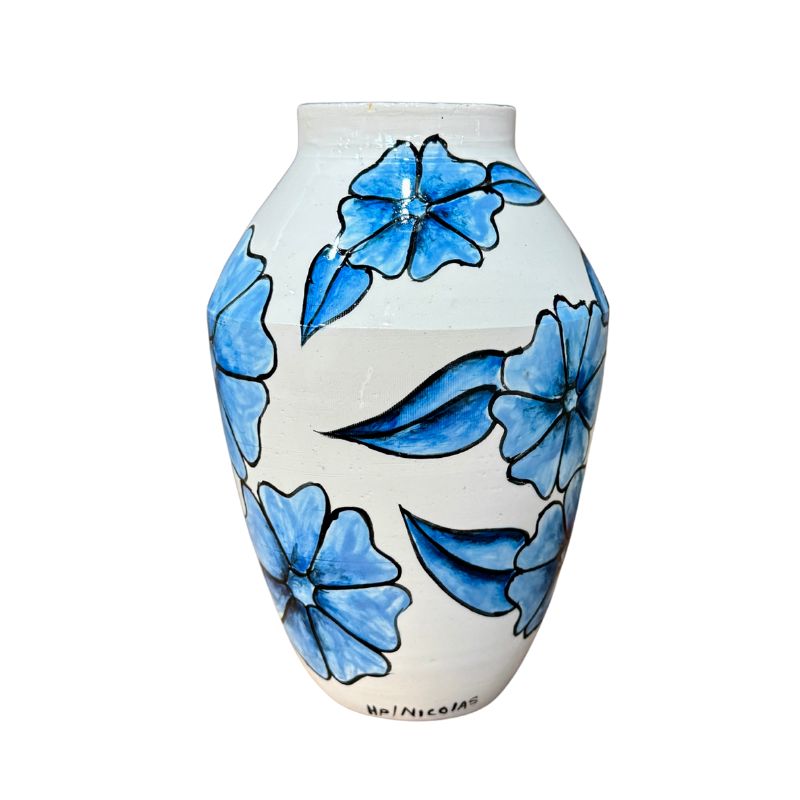 White vase with blue floral patterns on a white background