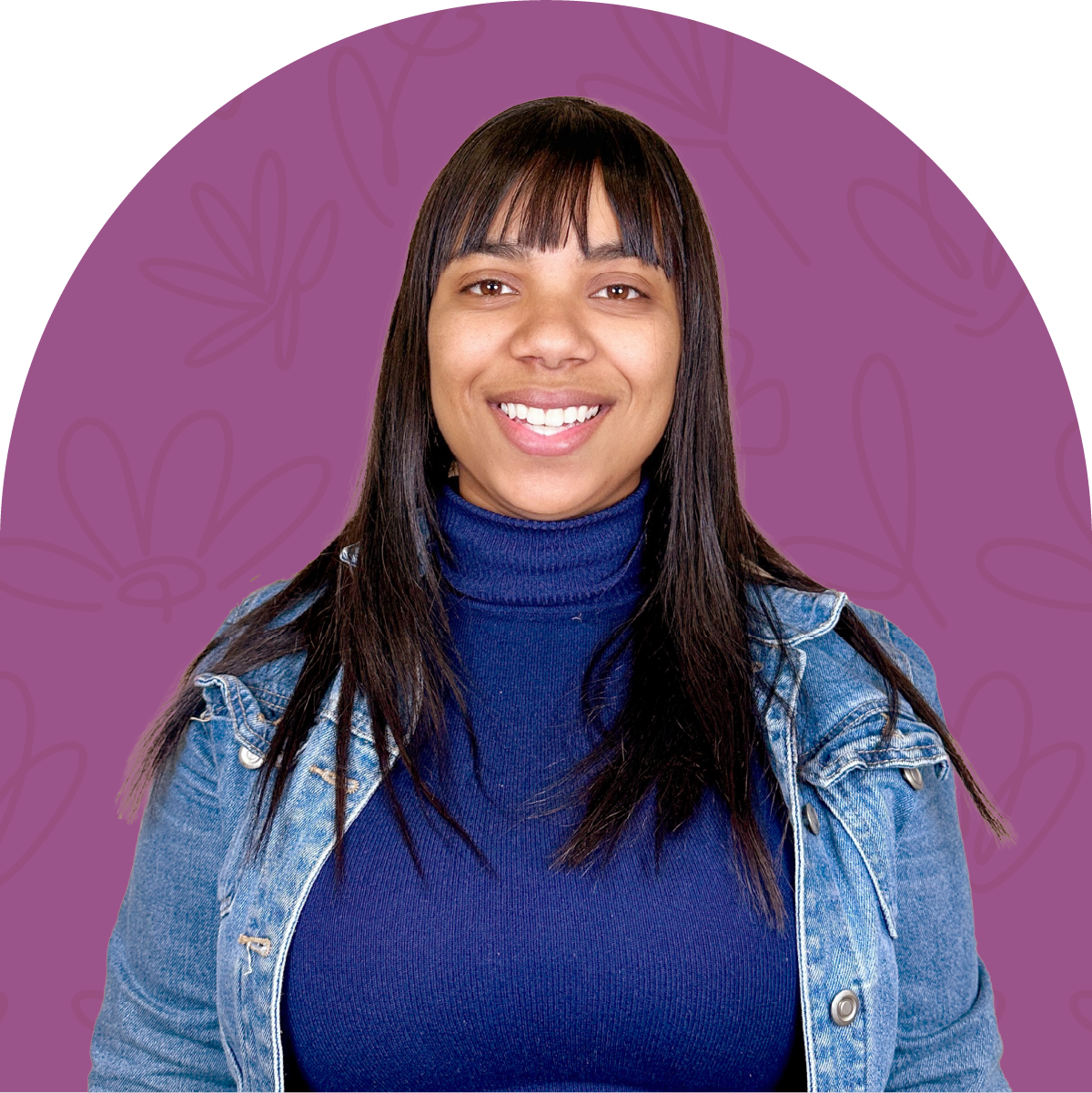 Portrait of Charnelle, an enthusiastic team member at Fabulous Flowers for five years, smiling and wearing a blue turtleneck and denim jacket. MEET THE TEAM at Fabulous Flowers and Gifts.