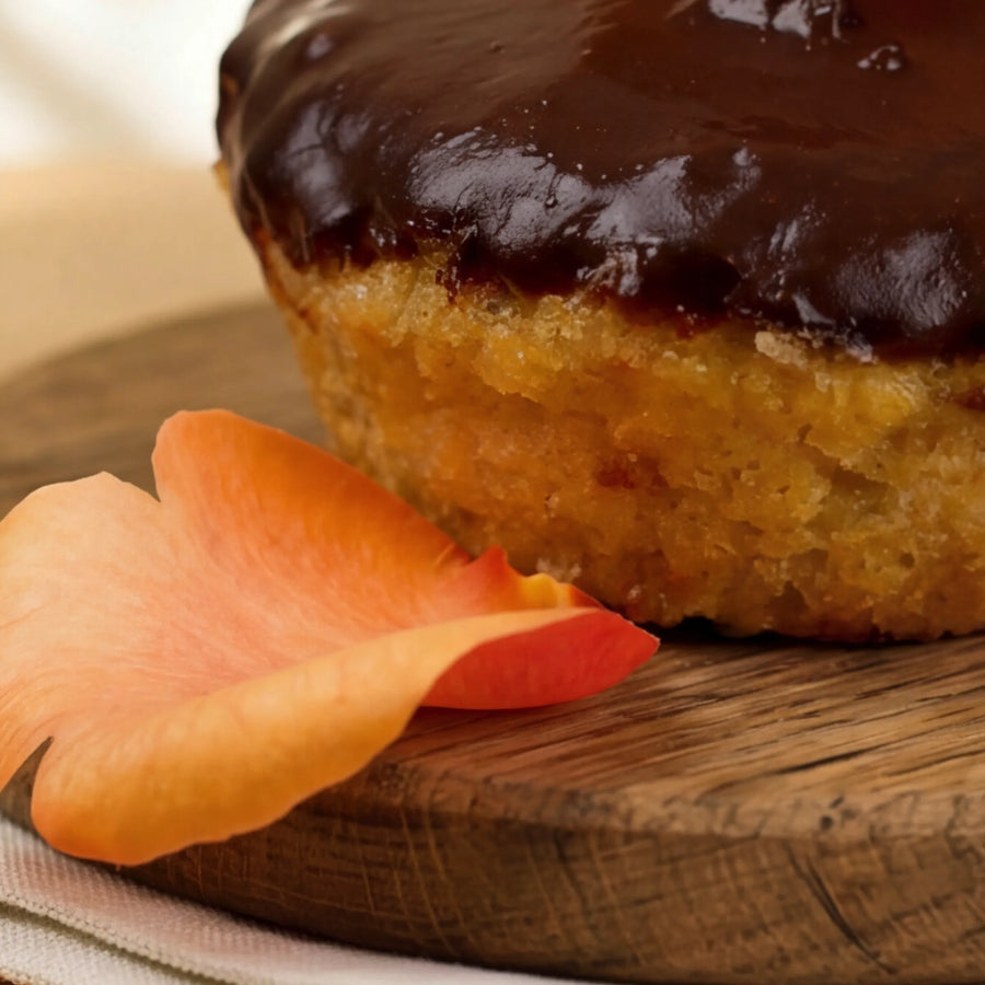 Macro of orange-flecked crumb on gluten-free chocolate orange cake, hand-made at Claremont studio