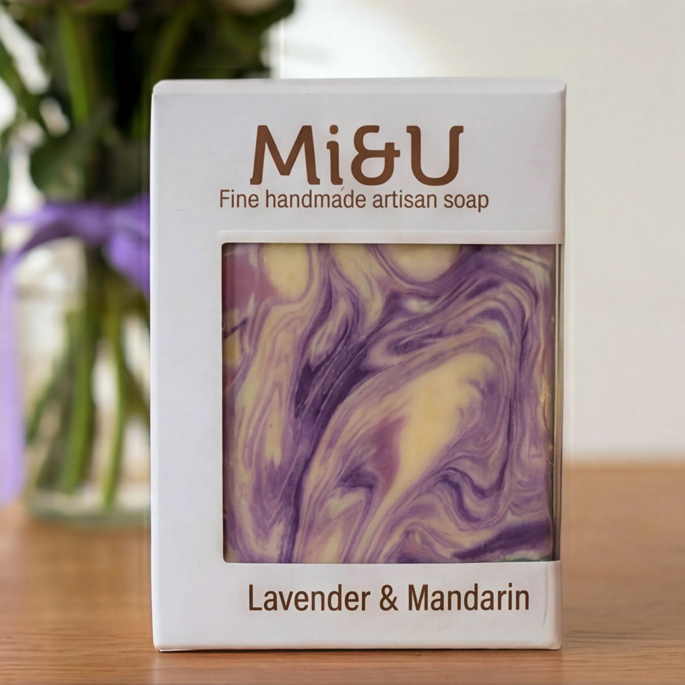 Mi&U Lavender & Mandarin artisan soap from the Cleanse & Calm self-care package, swirled purple and cream