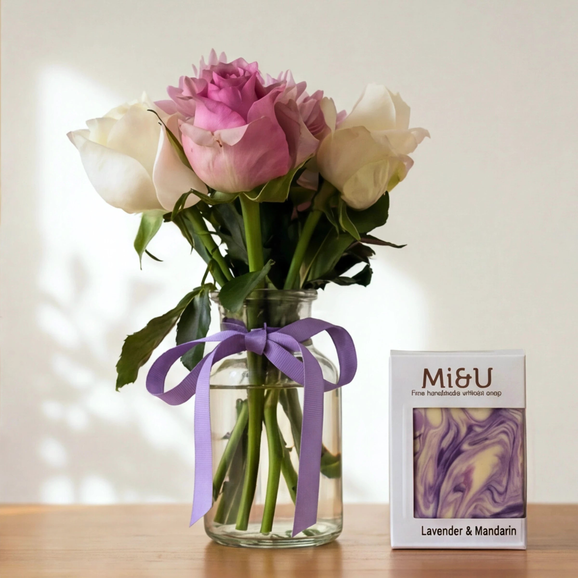 Cleanse & Calm gift set, a mauve and cream rose posy beside a Mi&U Lavender & Mandarin soap