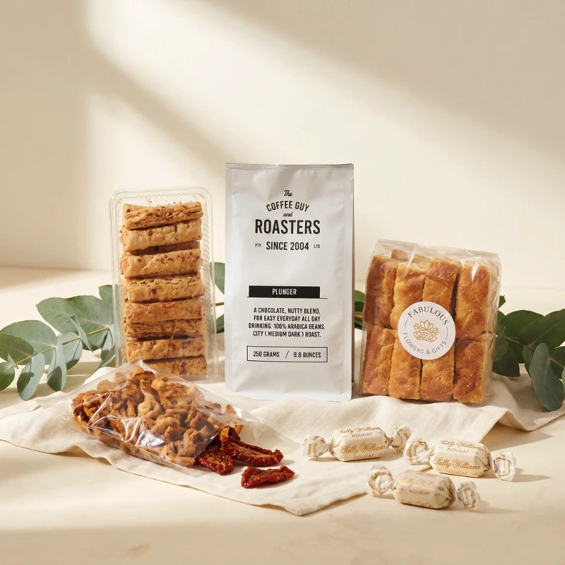 Comfort and Coffee gift styled with The Coffee Guy plunger coffee, cheese straws, rusks, Sally Williams nougat and sundried tomatoes, Fabulous Flowers