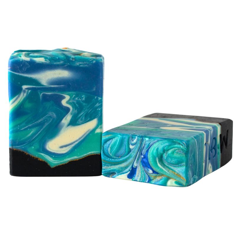Swirled artisan soap in ocean tones with black base, inspired by sea waves – Cooler Waters by Fabulous Flowers & Gifts.