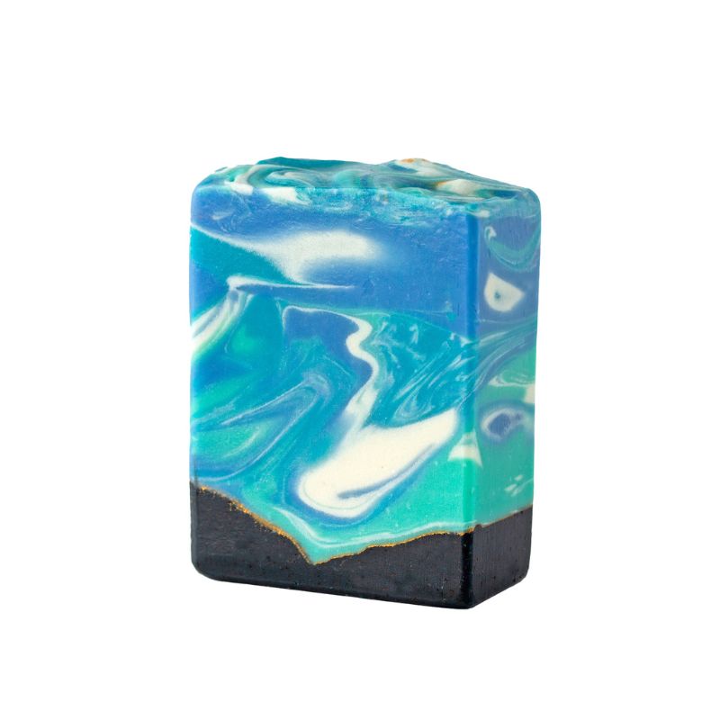 Blue, teal and cream artisan soap bar with black base and oceanic swirls – Cooler Waters Soap, handmade in South Africa.