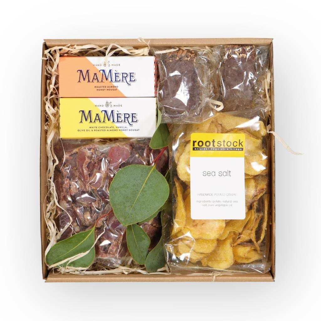 Dark chocolate Karoo crackers, MaMere nougat, biltong and sea salt arranged together for a flavourful gift idea for him - Fabulous Flowers