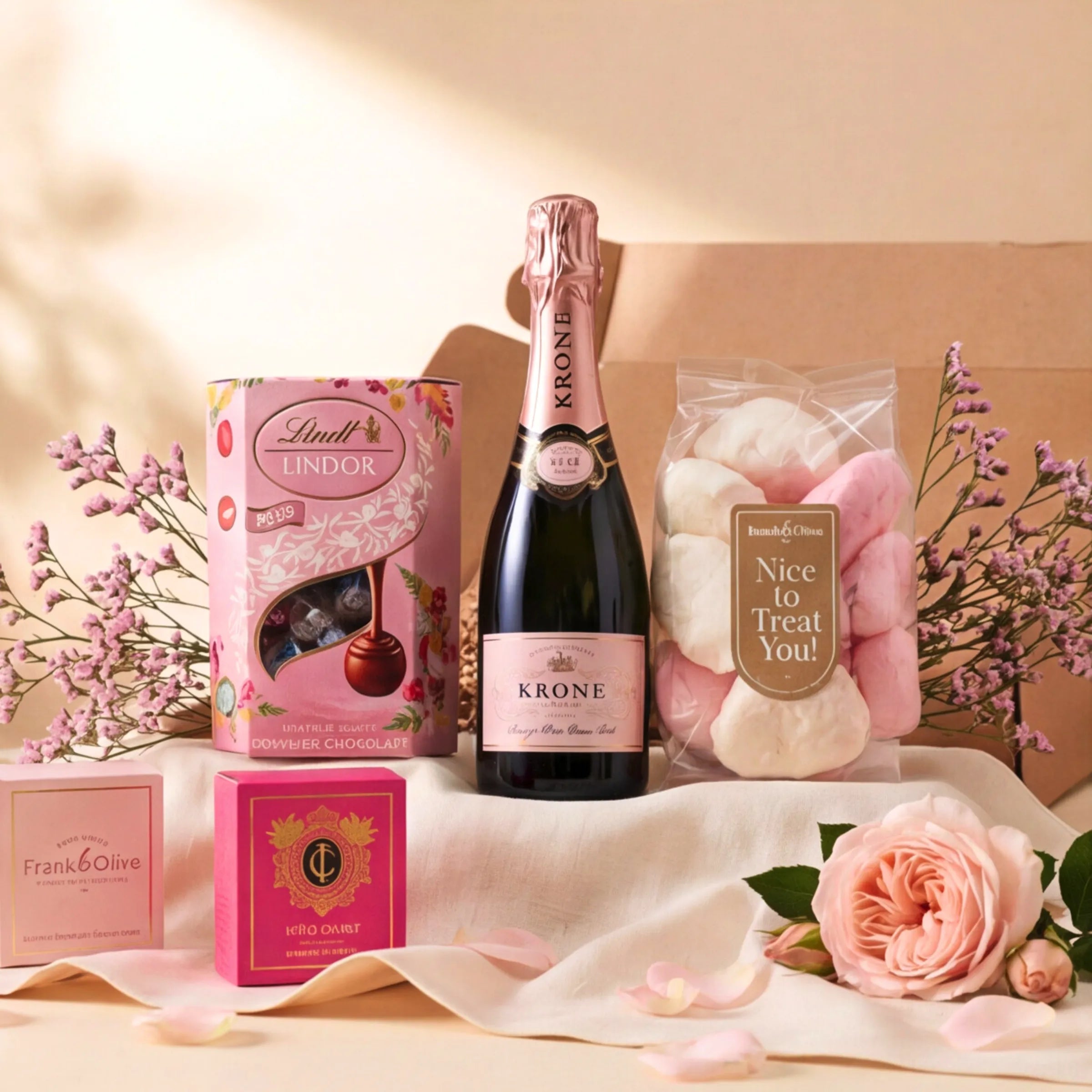 Daydream Delight luxury hamper with Krone Rose MCC, Lindt Lindor chocolates and Frank and Olive marshmallows by Fabulous Flowers