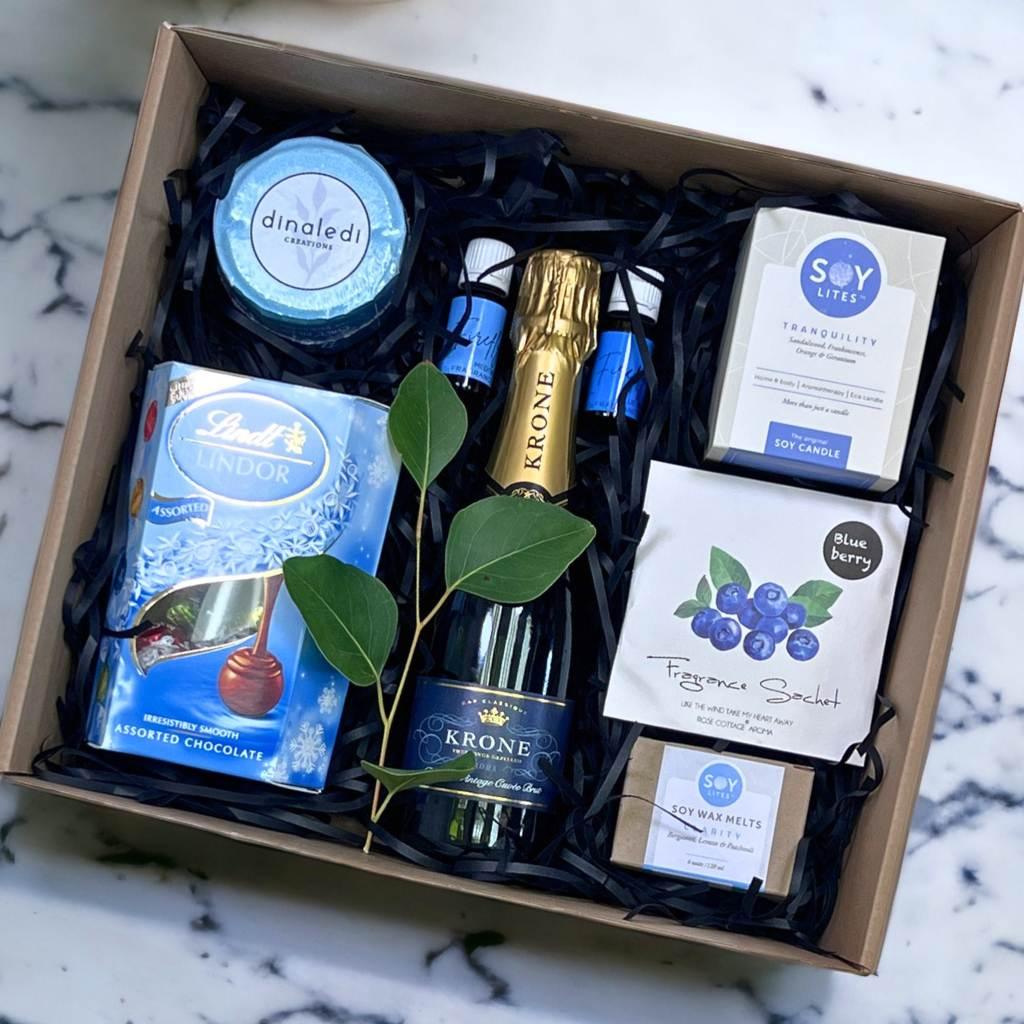 Decadence Delight Gift Hamper featuring premium items including chocolate, bubbly and SOY candle - Fabulous Flowers and Gifts