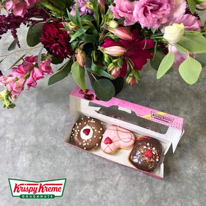Doughnuts in Bloom: A fusion of floral beauty and sweet indulgence by Fabulous Flowers and Gifts