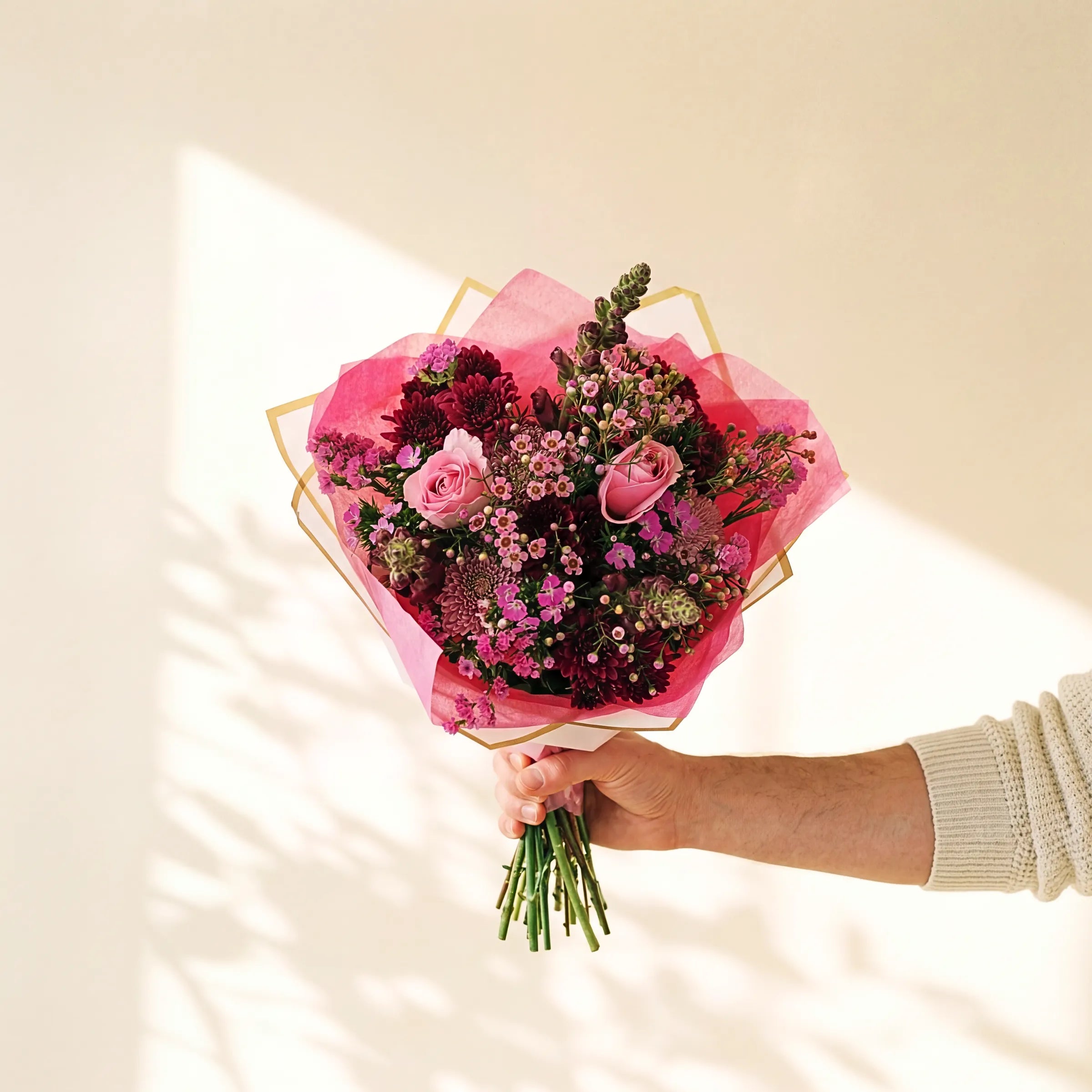 Enchanted Garden pink roses bouquet with burgundy chrysanthemums and waxflower, hand-tied by Fabulous Flowers Cape Town