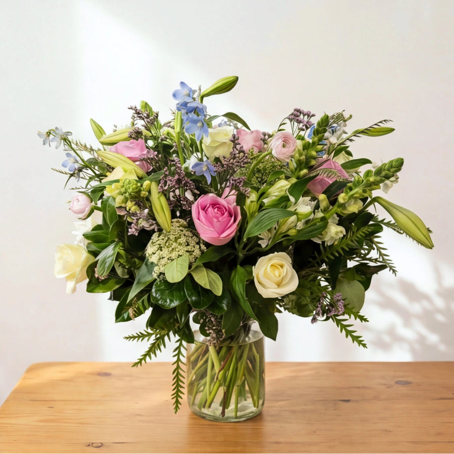 English Garden pastel flower arrangement in a clear glass vase, arranged by a Cape Town florist for same-day delivery