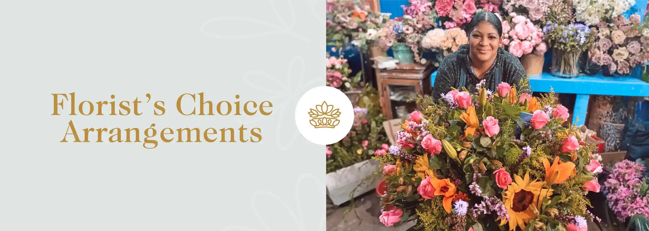 Florist with a large floral arrangement, representing the Florist Choice Arrangements Collection. Fabulous Flowers and Gifts.