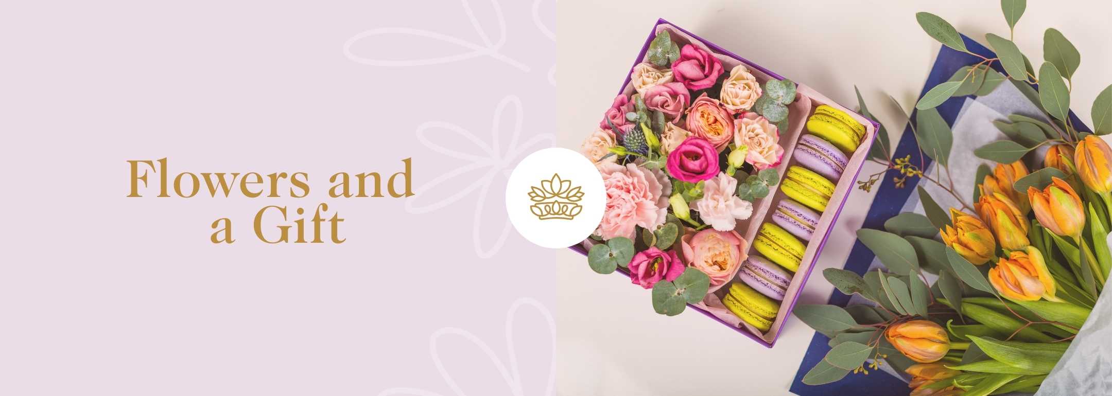 Image of a gift box filled with colourful flowers and an assortment of macarons, accompanied by a bouquet of vibrant orange tulips. The left side of the image has a pale pink background with the text 'Flowers and a Gift' in elegant gold font.