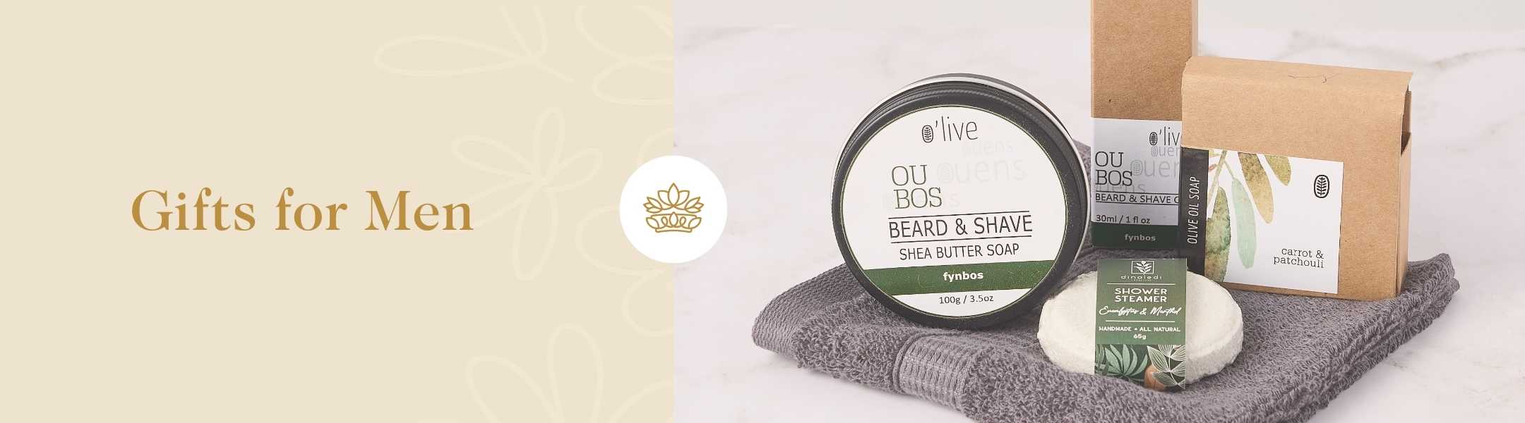 Gifts for Men - Selection of high-quality grooming products including beard and shave soap, olive oil soap, and a shower steamer, beautifully presented on a soft towel.