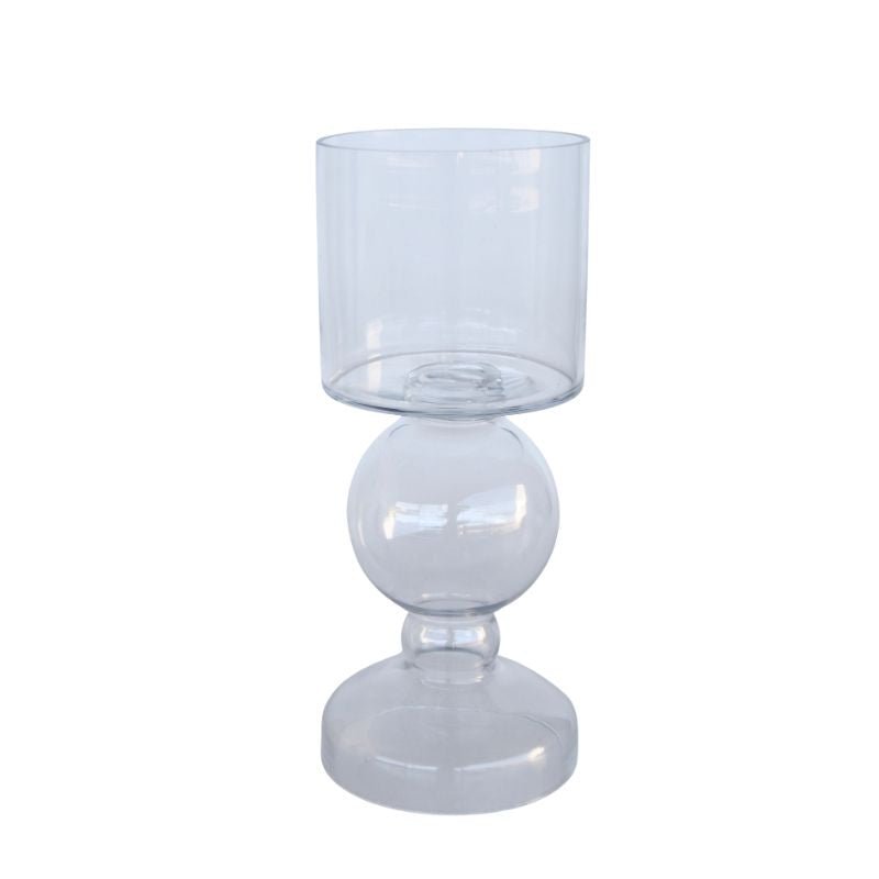 Clear glass candle holder on a white background