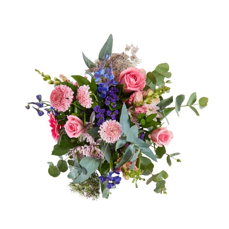 Jar arrangement of flowers with pink roses, green leaves, and blue flowers on a white background