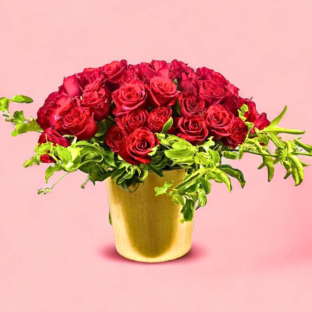Elegant Golden Majesty red roses in premium golden container - Fabulous Flowers and Gifts