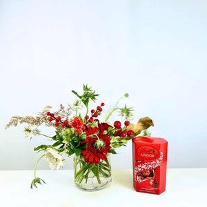 Festive Holly Jolly Blossom flower arrangement in vase with Lindt Chocolate option - Fabulous Flowers