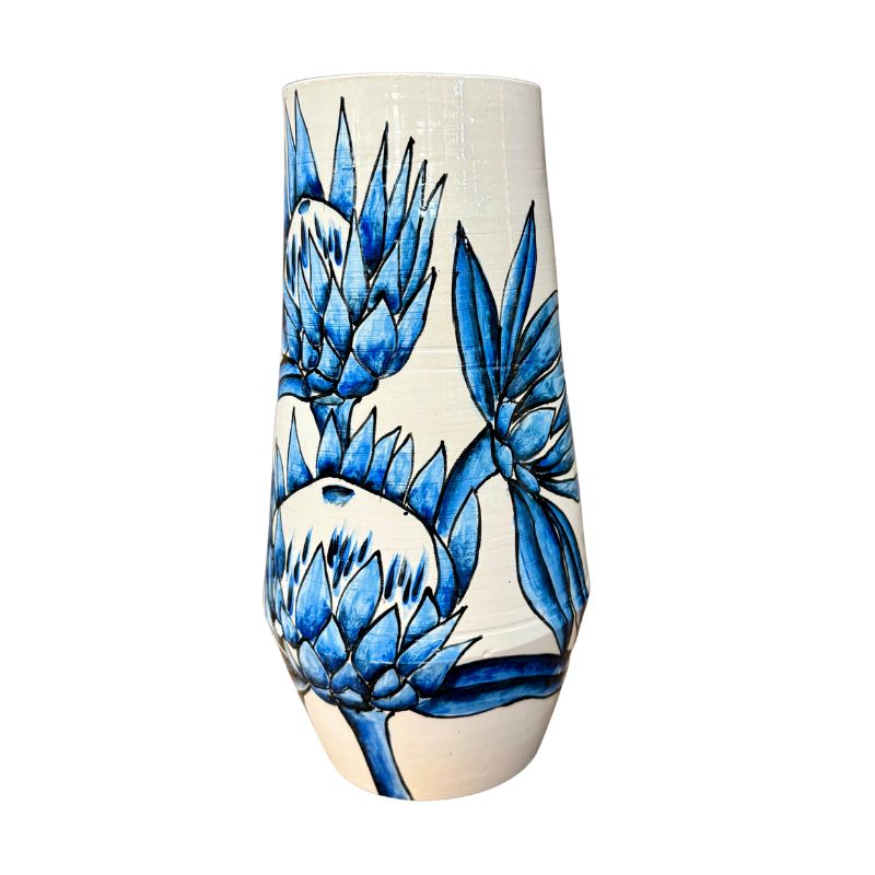 Vase with blue floral design on a white background