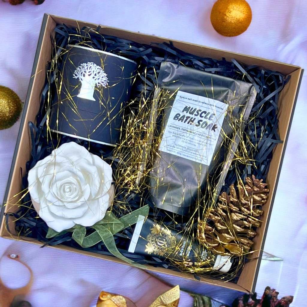 Luxurious Christmas Hamper Basket with curated self-care essentials including muscle soak, diffusers, hand cream and Christmas decor - Fabulous Gifts