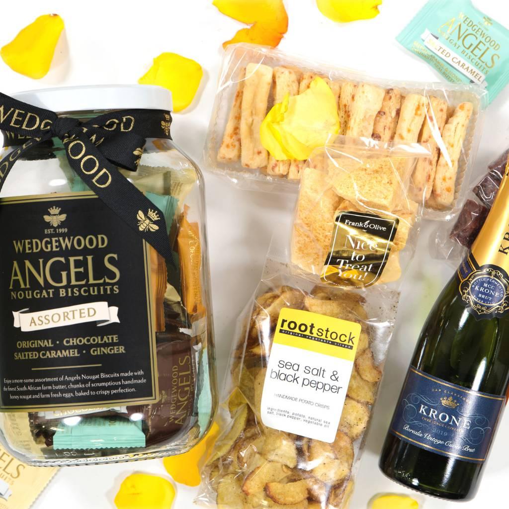 A delicious snack hamper with Wedgewood Nougat Biscuits and Iridescent Krone Borealis Bottle - Fabulous Flowers