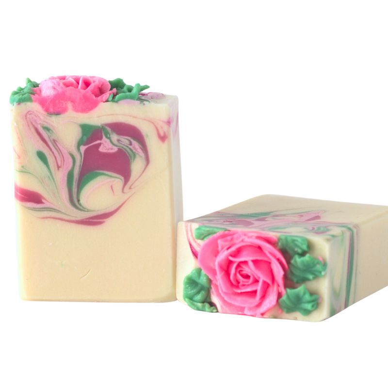 La Rose soap with sculpted pink rose top and elegant pink and green swirl pattern through creamy base