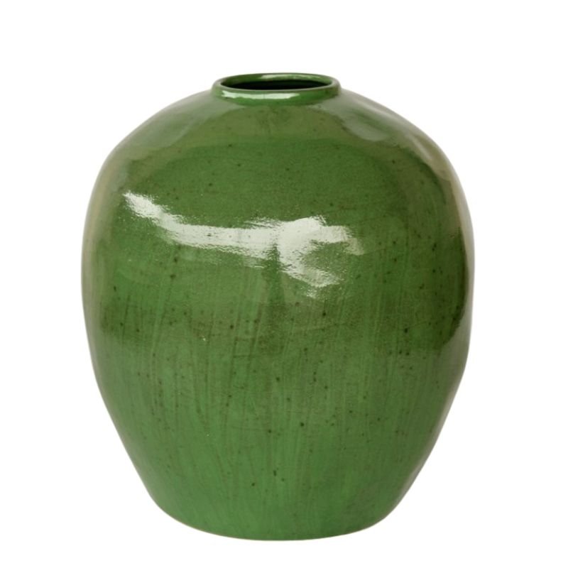 Green ceramic vase on a white background