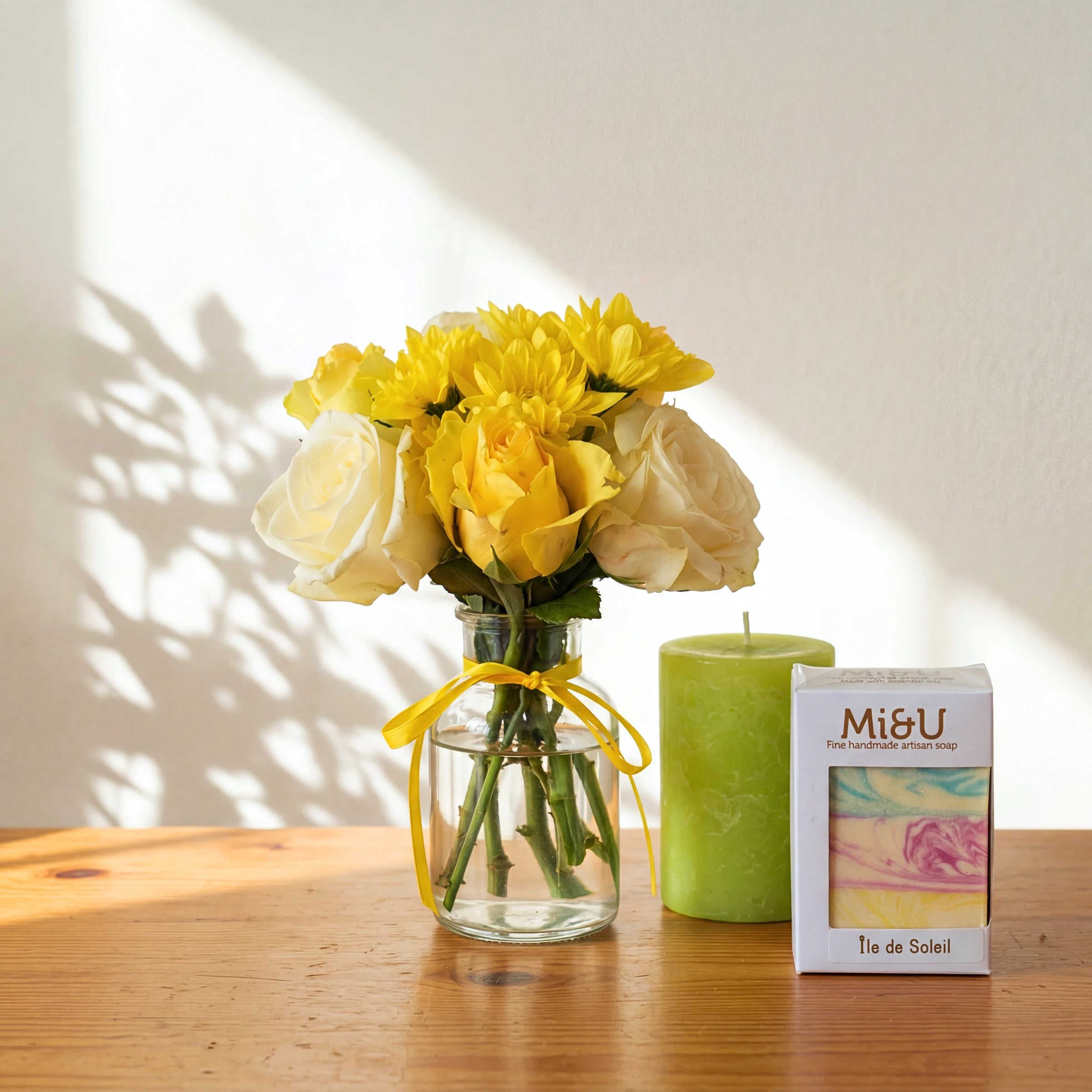 Lather & Light candle gift set: a yellow and cream rose posy, a green pillar candle and Mi&U artisan soap