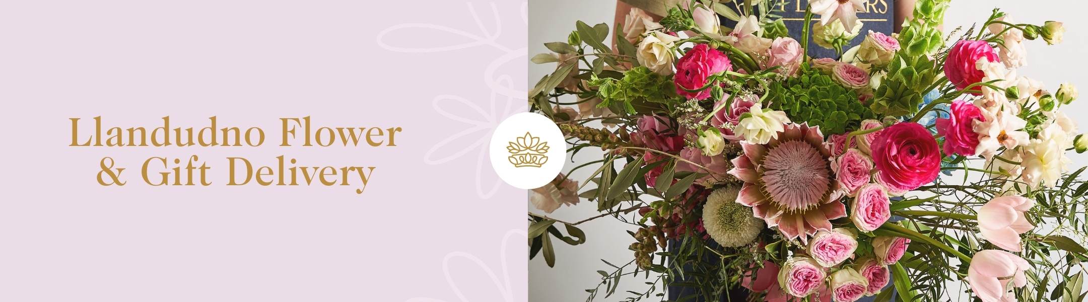 Llandudno Flower and Gift Delivery - Fabulous Flowers & Gifts bouquet with vibrant pink, white, and green blooms held by a person.