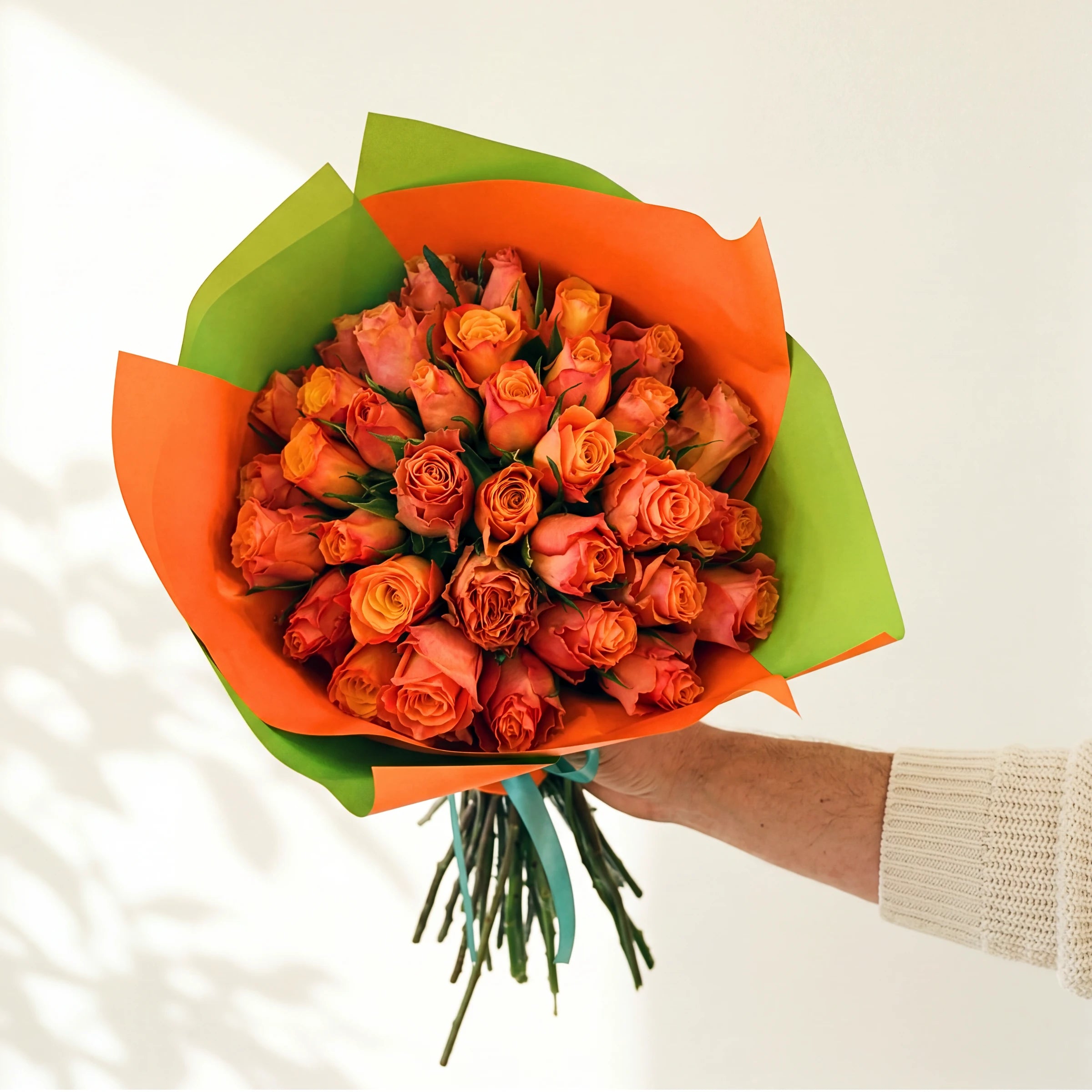 The largest Marmalade, three dozen bright orange roses in orange and lime green wrap, by Fabulous Flowers