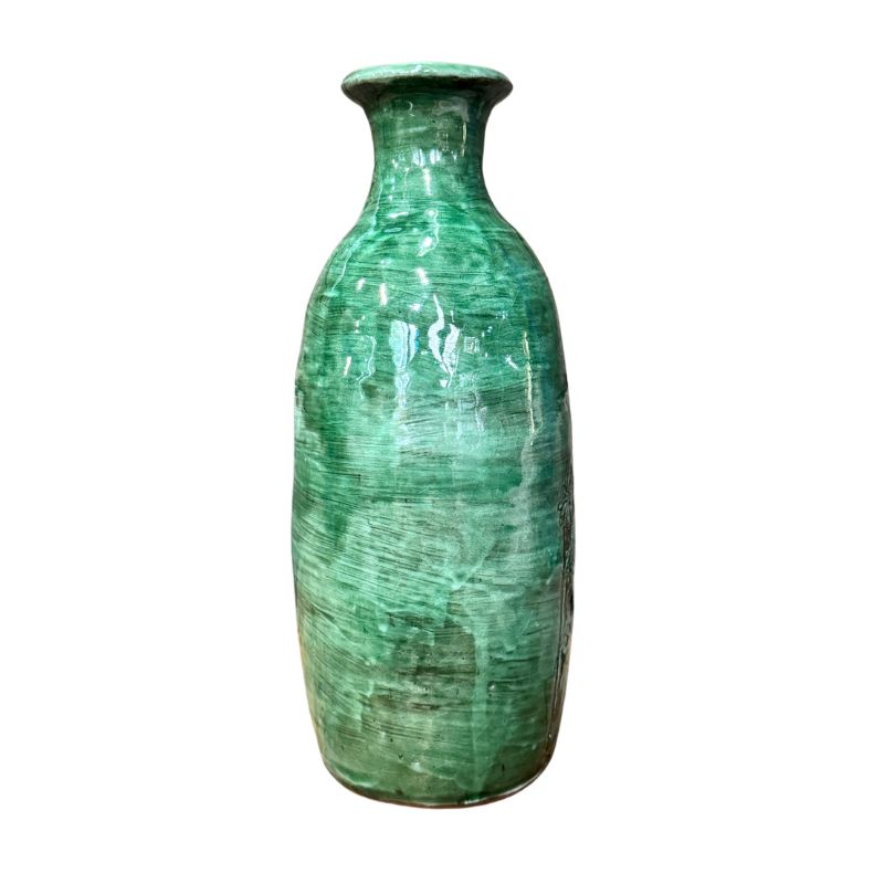 Green textured vase on a white background