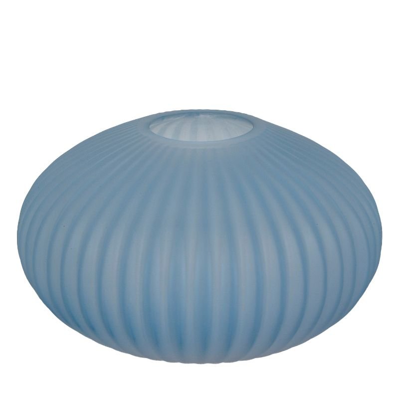 Blue ribbed glass vase on a white background