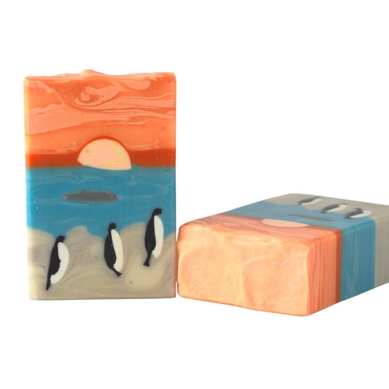 Penguin’s Cove artisan soap bar with penguin design and sunset, handmade and available at Fabulous Flowers