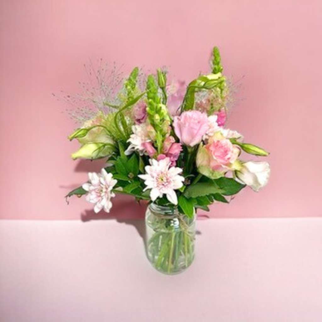 Velvet caress of pink roses paired with snapdragons and lisianthus | Fabulous Flowers and Gifts