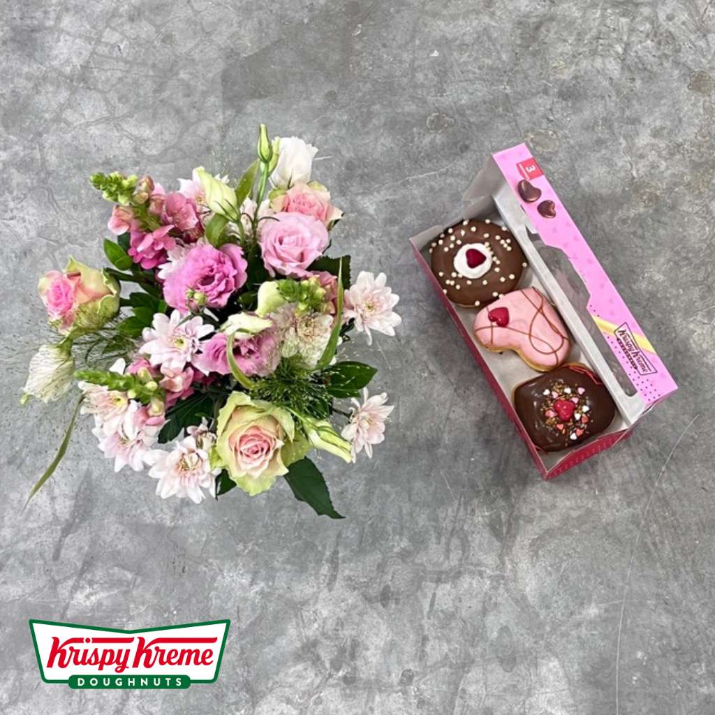 Red roses and gerberas in glass jar vase with Krispy Kreme doughnuts | Fabulous Flowers and Gifts