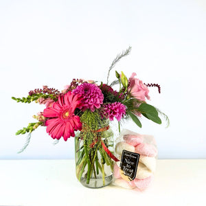 Elegant Petals and Poetry flower gift with gerbera daisies and care with marshmallows by Fabulous Flowers and Gifts.