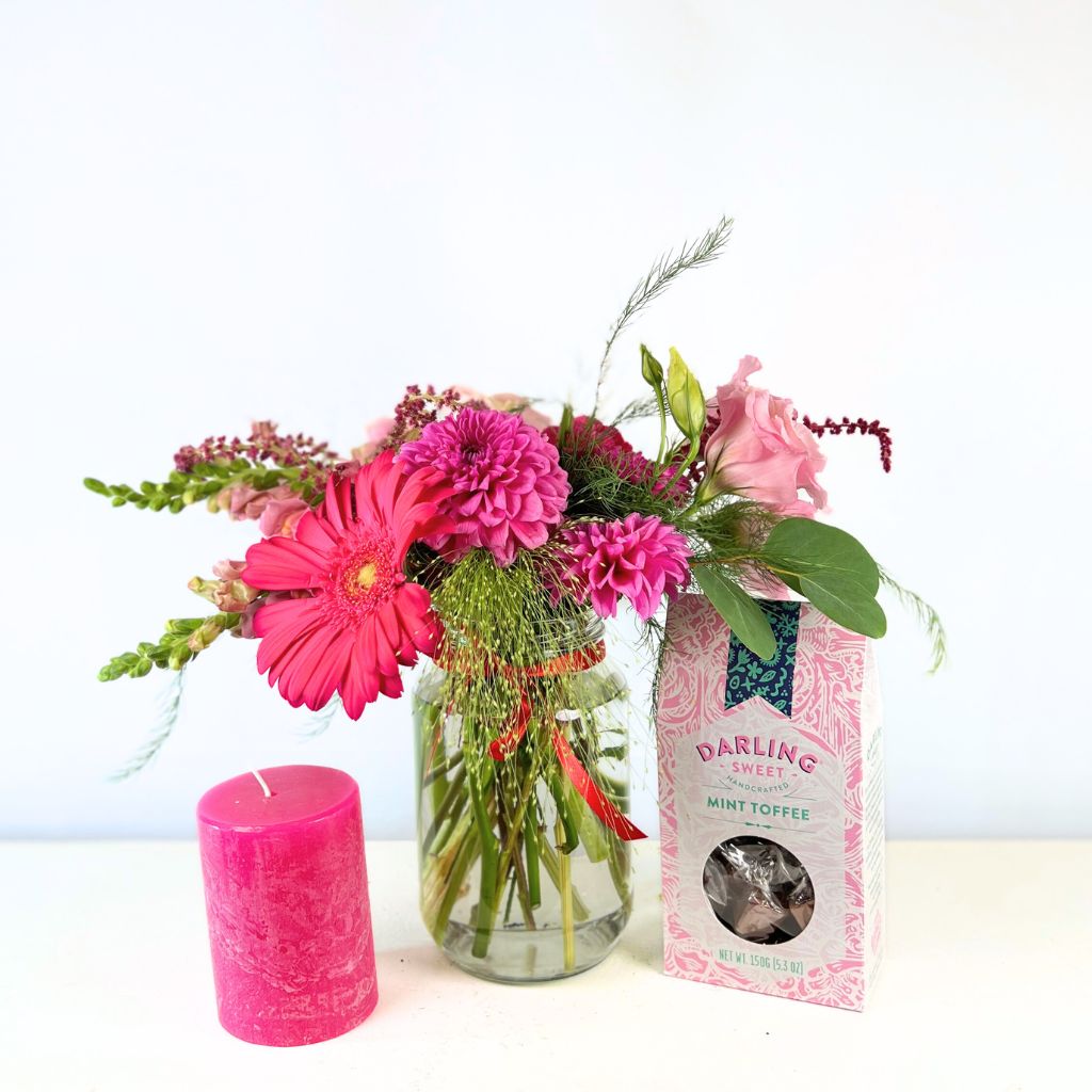 Petals and Poetry floral and toffee gift set with cerise candle, a touch of royal elegance by Fabulous Flowers and Gifts.