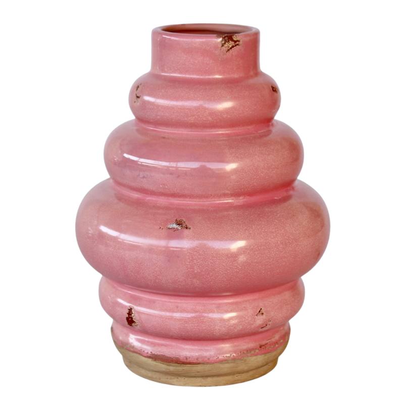 Pink ceramic vase on a white background