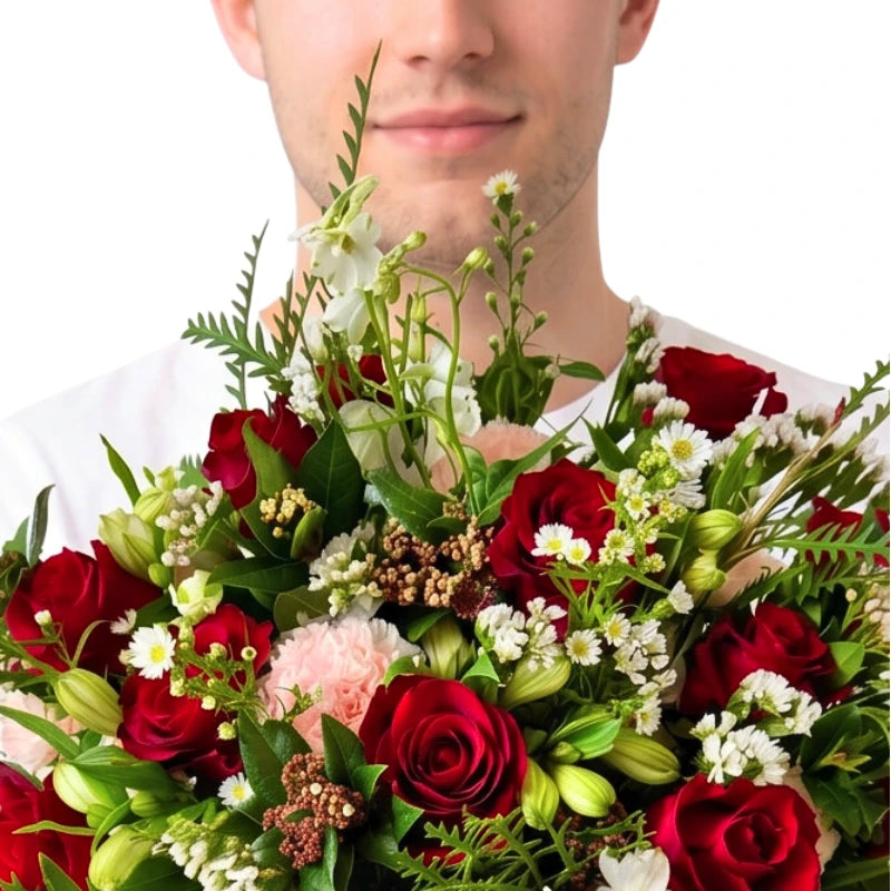 Hand-tied red rose bouquet with soft pink carnations, white asters and pepperberry, romantic arrangement