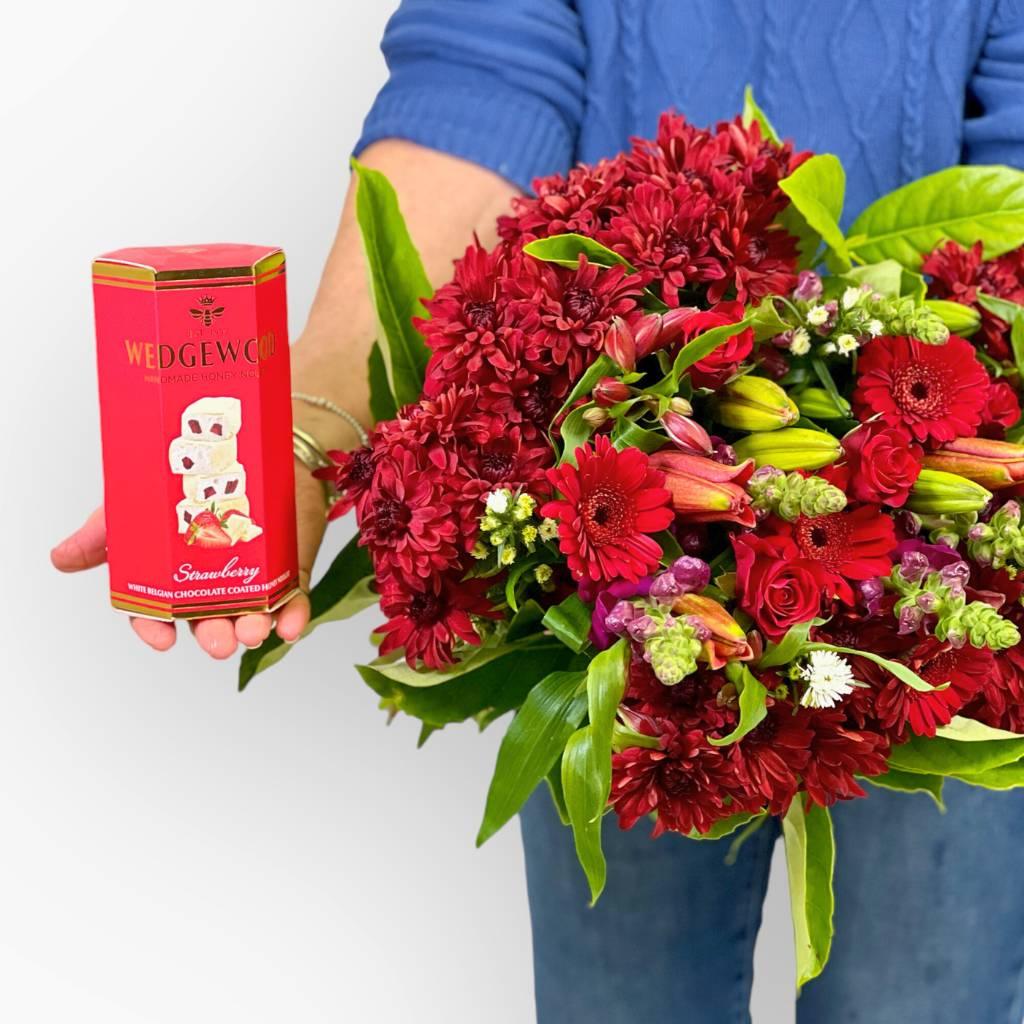 Close-up of Red Petal Poetry Bouquet featuring red roses and gerberas - Fabulous Flowers