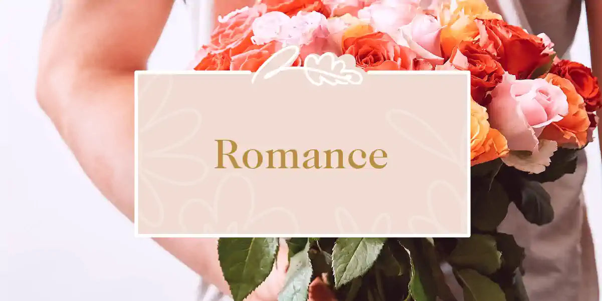 A person holding a bouquet of mixed roses, evoking feelings of romance. Fabulous Flowers and Gifts - Romance