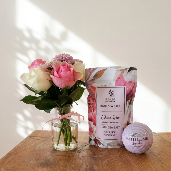 Rose & Repose spa gift set: pink and cream rose posy, Dinaledi rose bath salt and a lavender bath bomb
