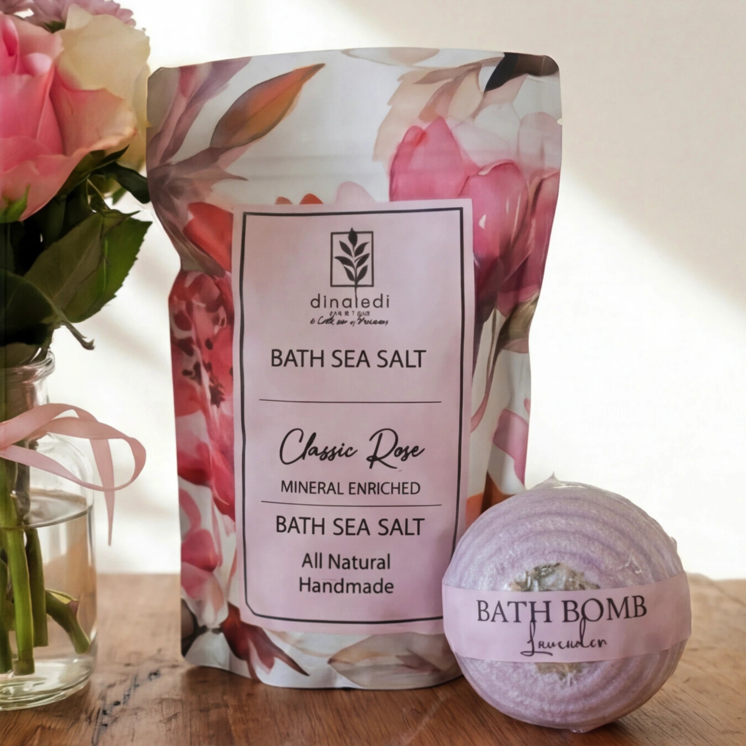 Close-up of the Rose & Repose set, roses with Dinaledi Classic Rose bath sea salt and a bath bomb