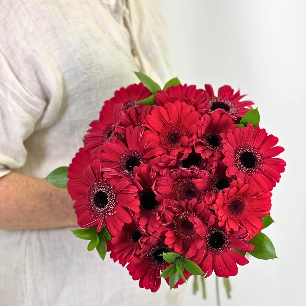 Ruby Red Gerbera Bouquet with Lindt Lindor Cornet Milk Chocolate for Same-Day Delivery badge for orders before 12 pm in Cape Town - Fabulous Flowers