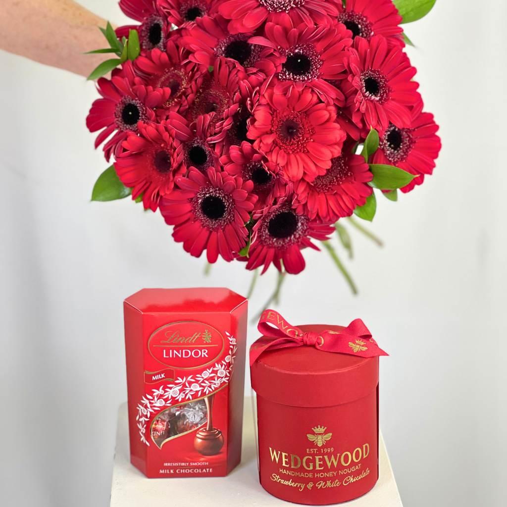 Ruby Red Gerbera Bouquet with optional luxury add-ons like Lindt Cornet Truffles and Wedgewood Small Hat Box Combo - Fabulous Flowers