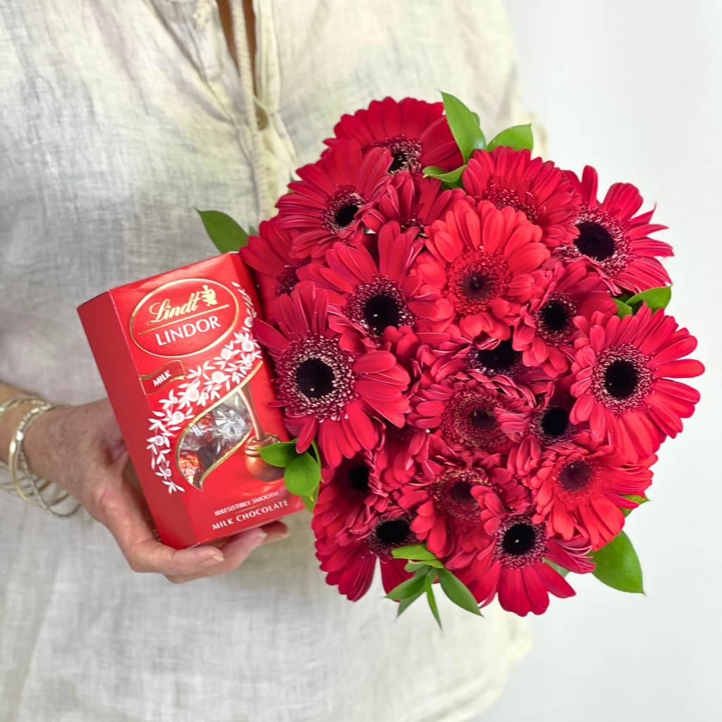 Ruby Red Gerbera Bouquet with Lindt Lindor Cornet Milk Chocolate for Same-Day Delivery badge for orders before 12 pm in Cape Town - Fabulous Flowers